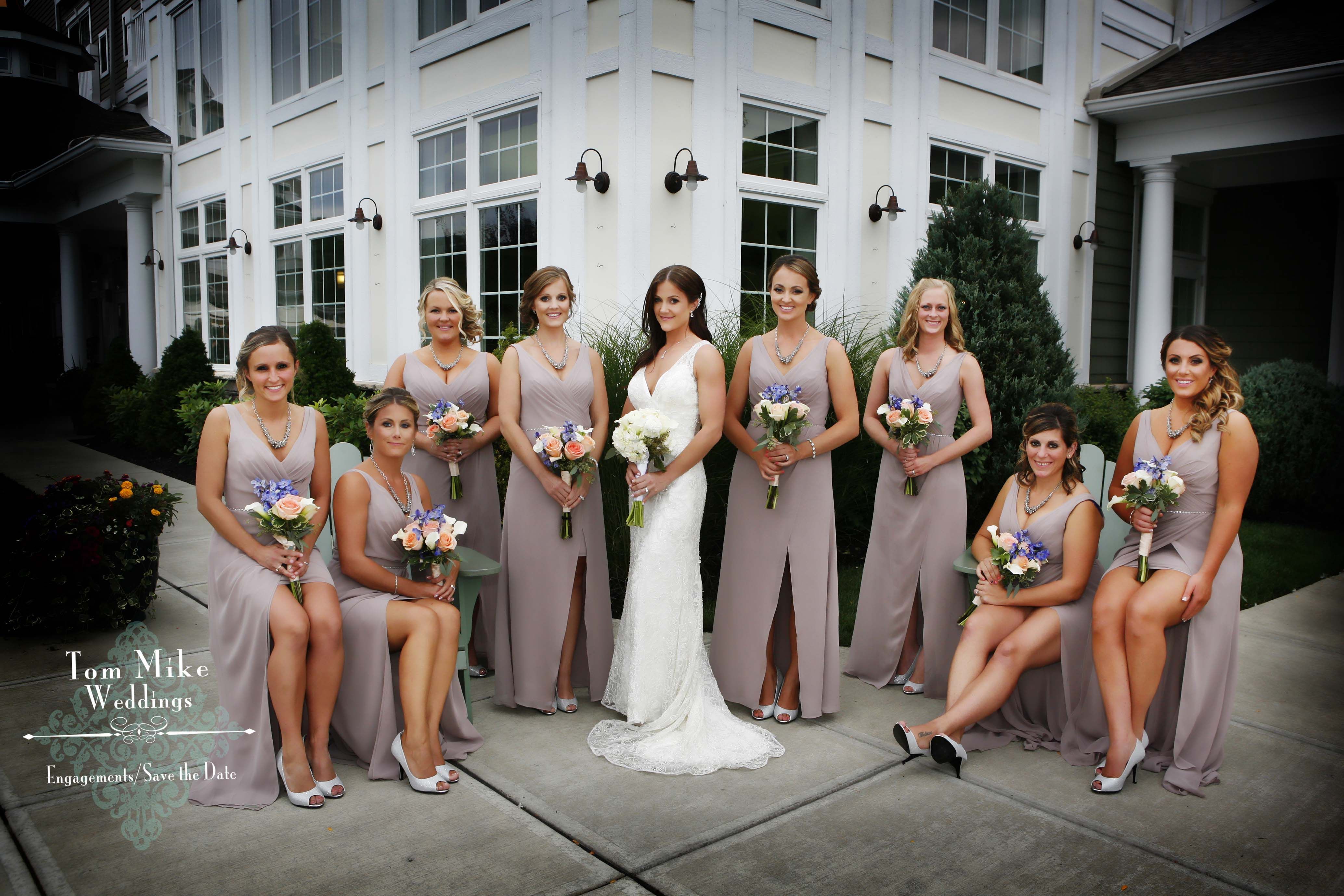 Bride and bridesmaids on the patio near the pool area