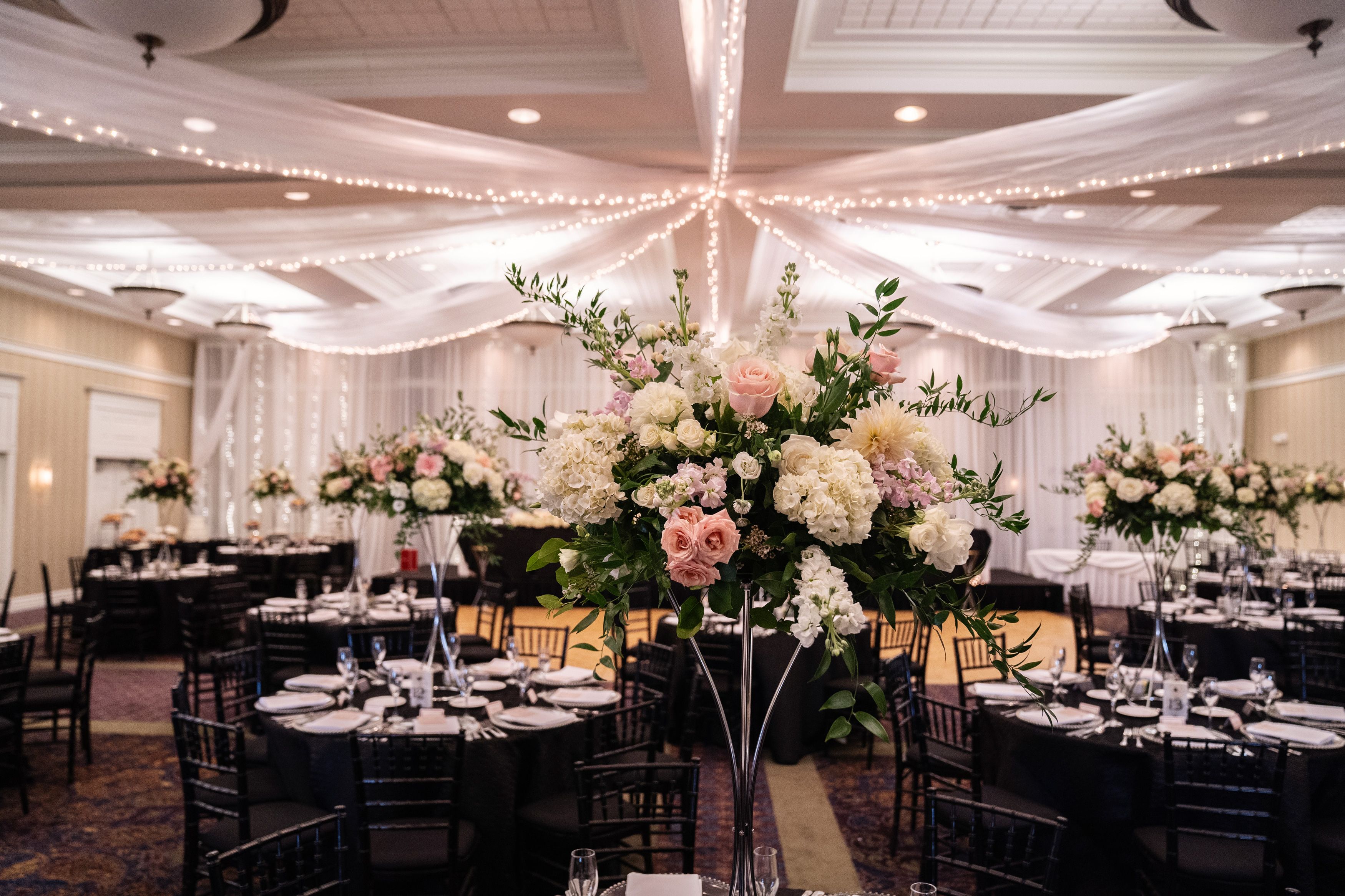 A beautiful ballroom is set for a wedding at the Watkins Glen Harbor Hotel